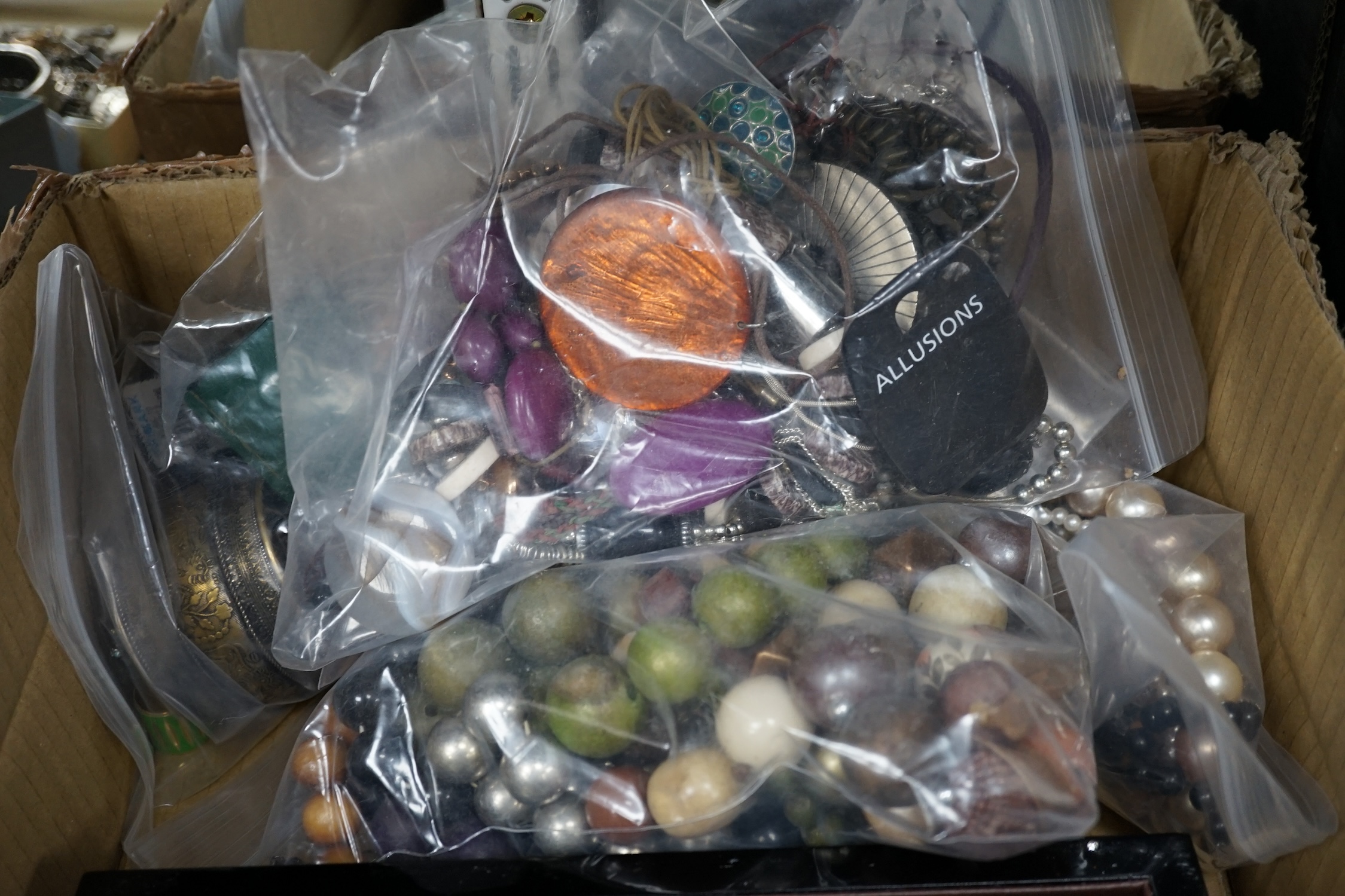 A quantity of assorted costume jewellery. Condition - poor